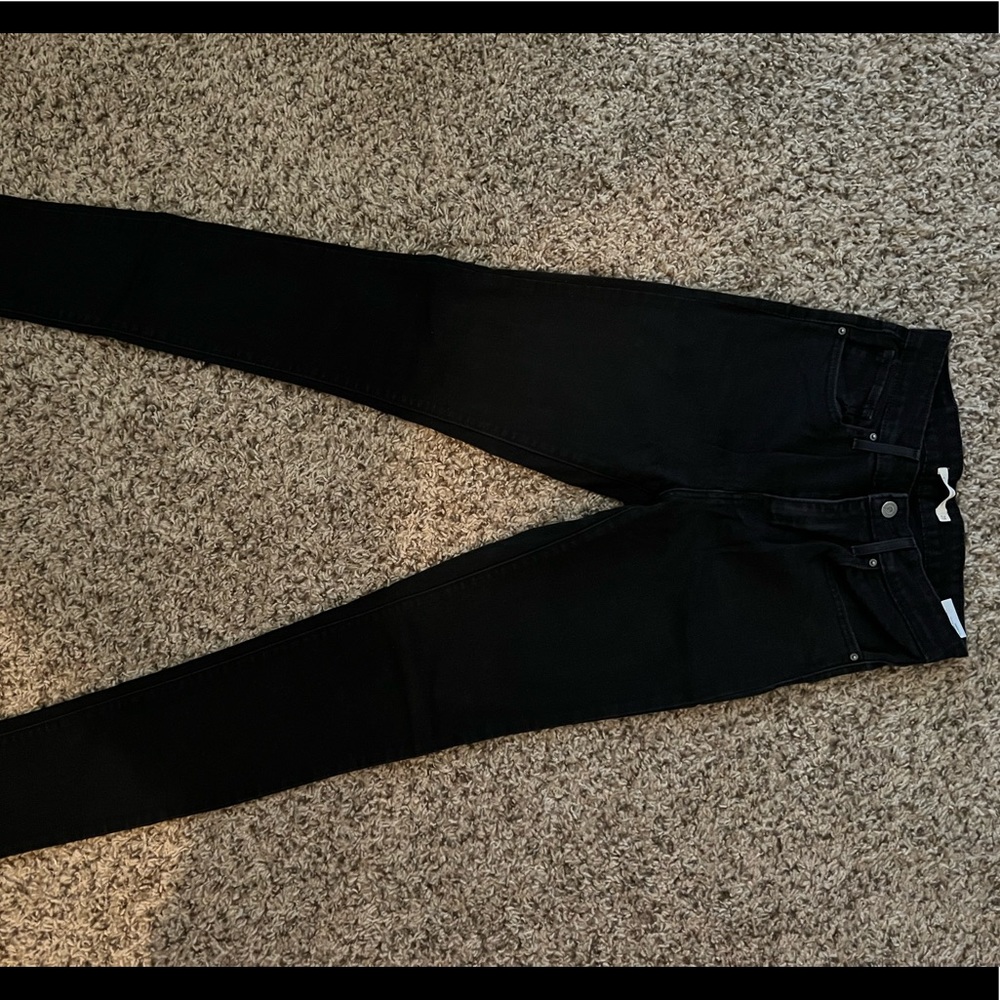 Levi’s black long skinny jeans. W28 L34